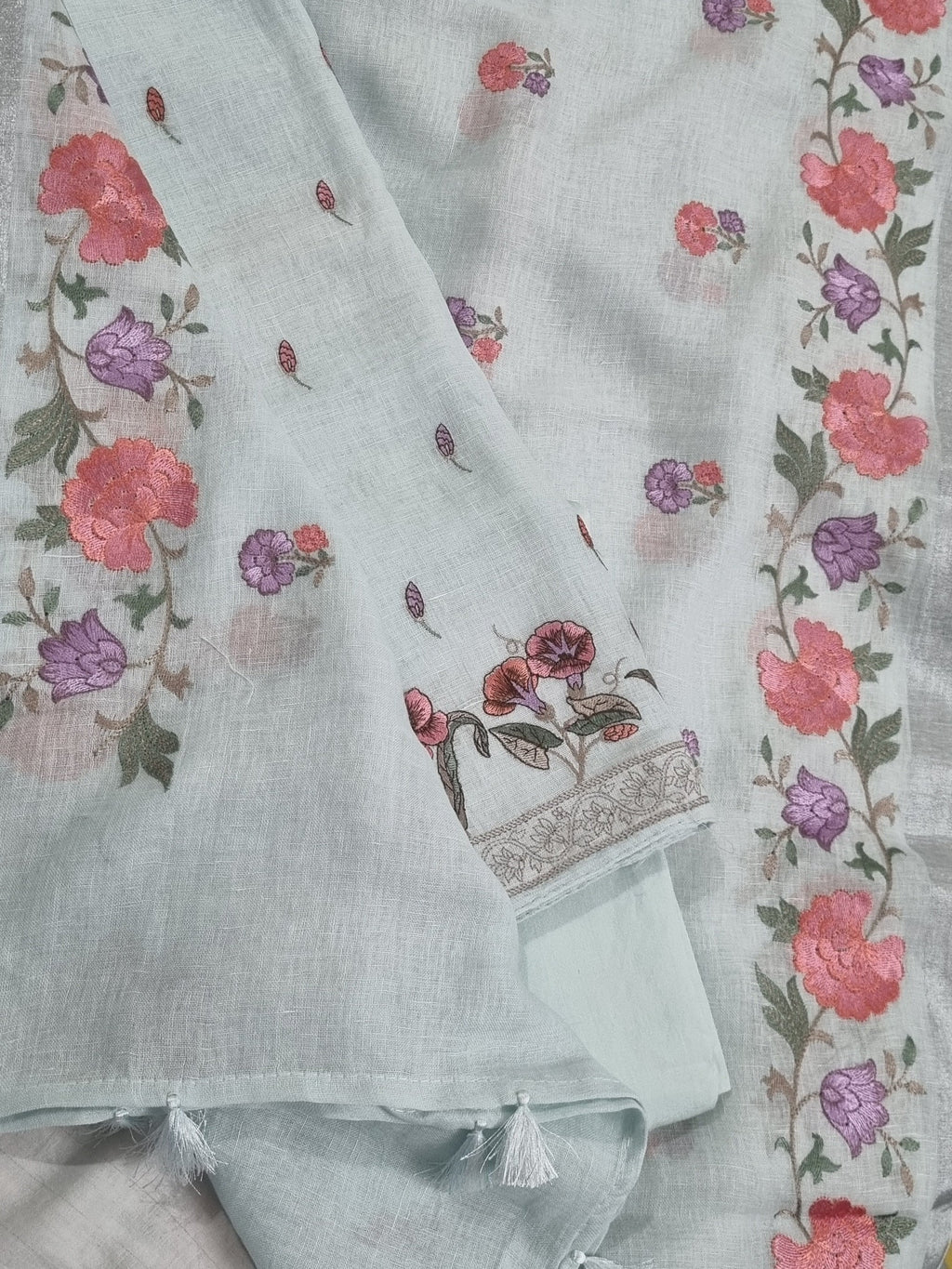 Floral machine embroidery close-up – baby blue linen unstitched suit set