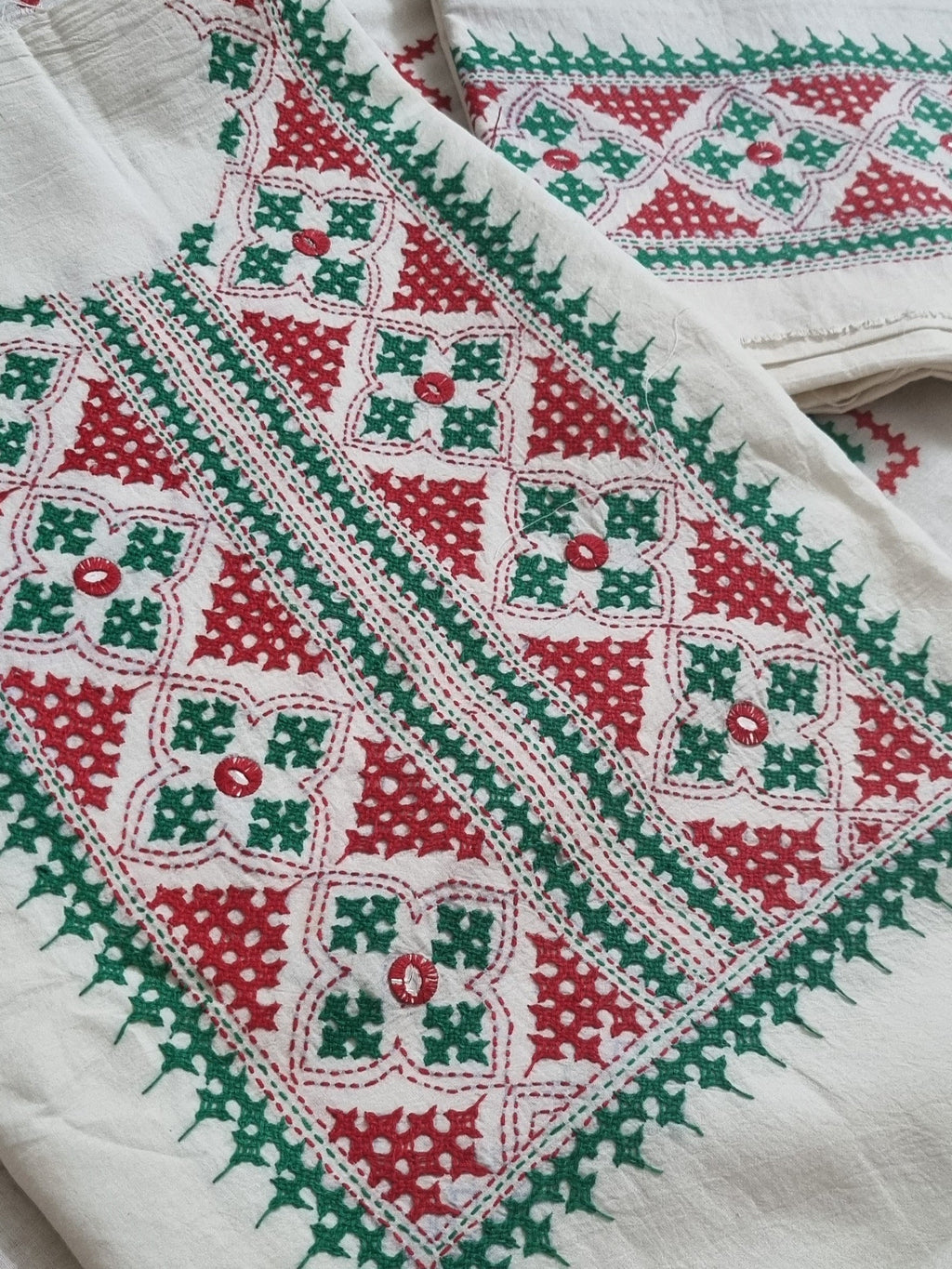 Cream cotton unstitched salwar suit with red green Sindhi embroidery – flat lay