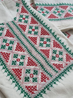 Cream cotton unstitched salwar suit with red green Sindhi embroidery – flat lay