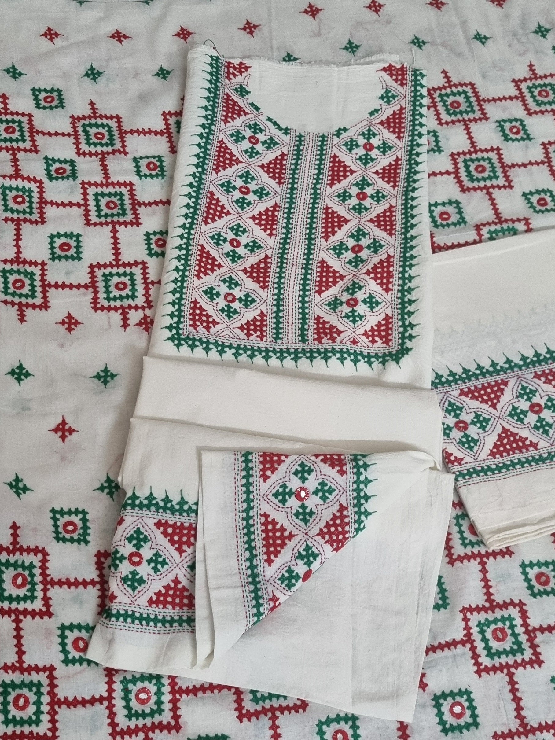 3-piece cream Sindhi embroidered unstitched suit in red and green – fabric detail