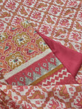 Chanderi Silk fabric close-up with Patola inspired print in red green and orange – Tantuvanacrafts