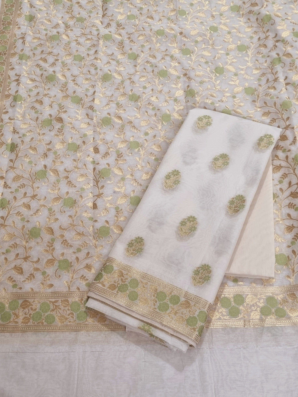 Cream and green Banarasi woven Chanderi silk 3-piece unstitched suit set – front flat lay
