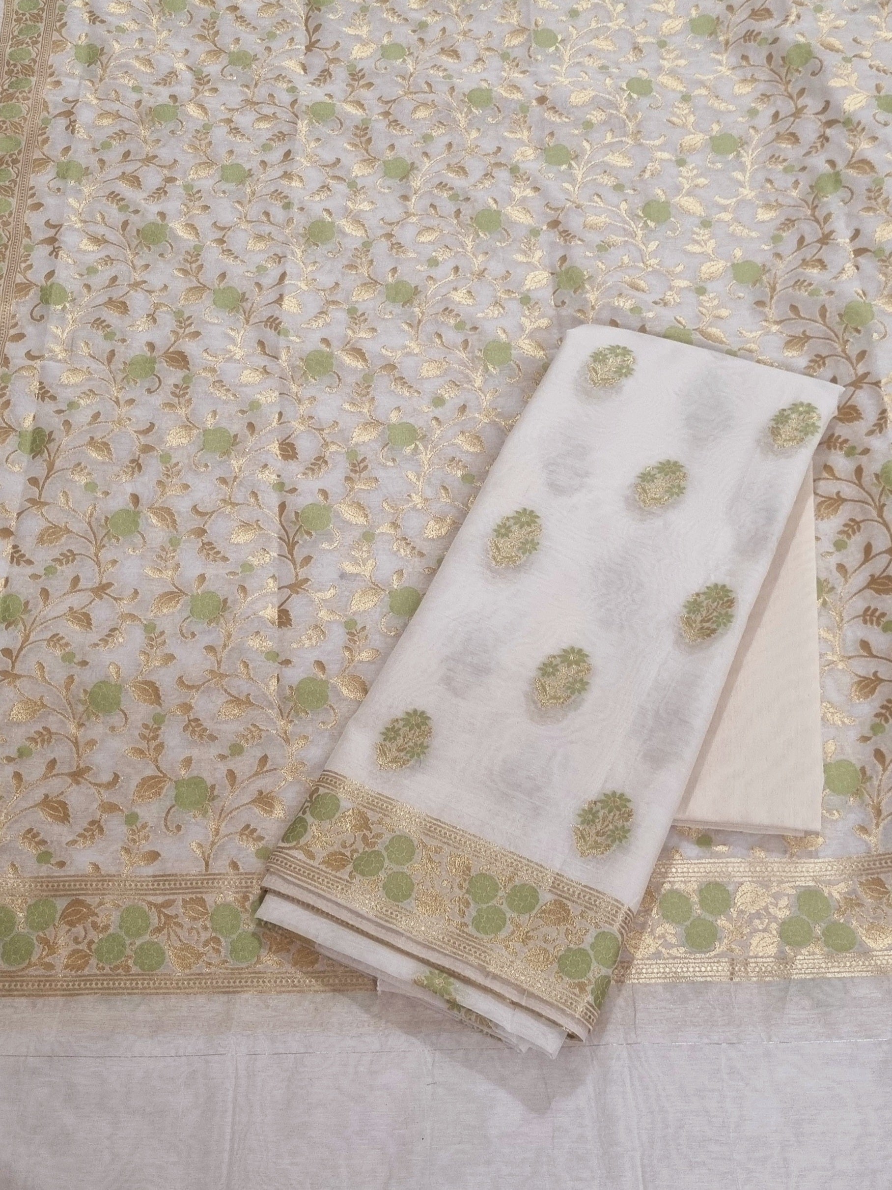 Cream and green Banarasi woven Chanderi silk 3-piece unstitched suit set – front flat lay