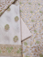 Cream and green Banarasi unstitched suit set – top angle view