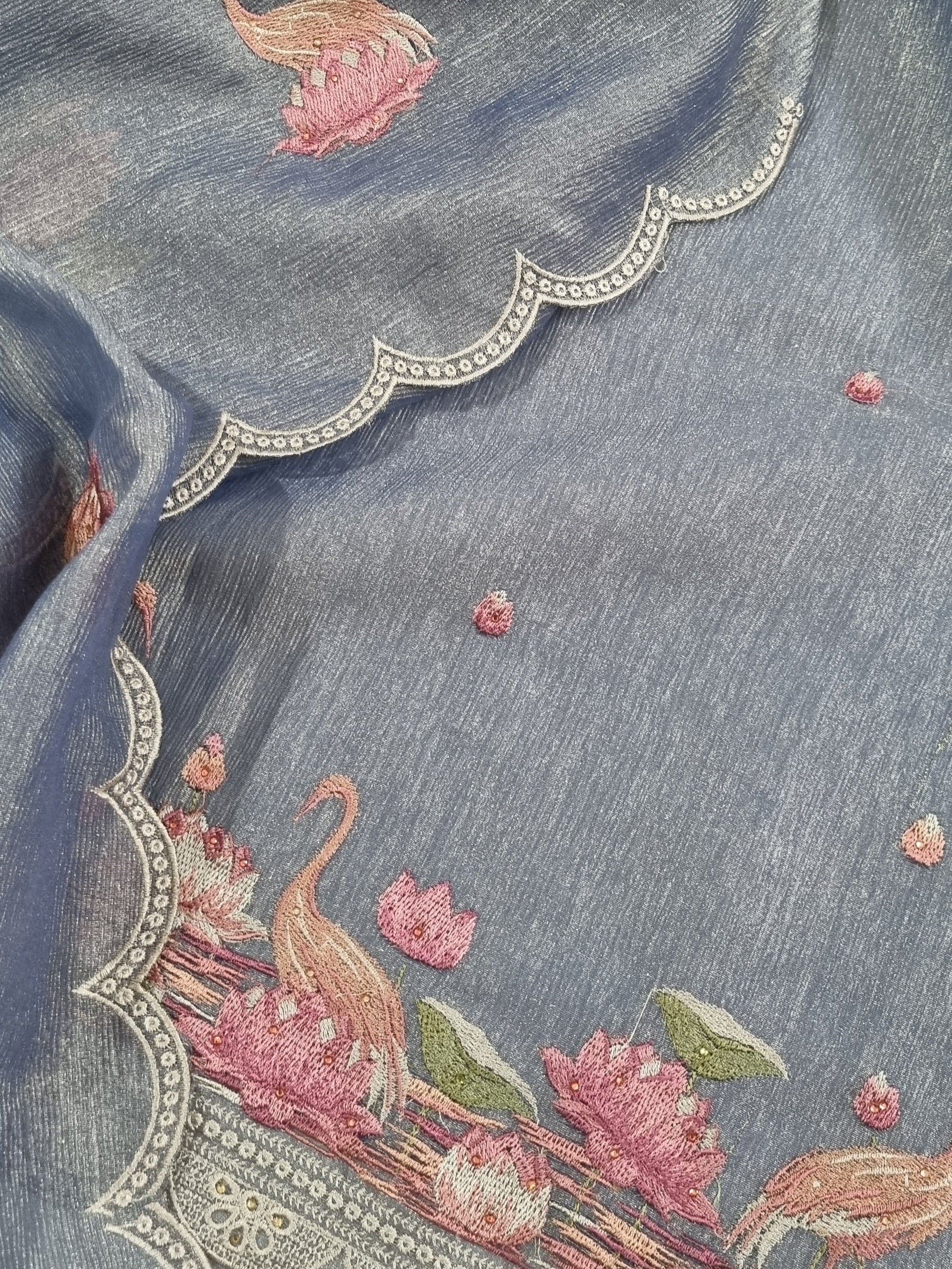 Detail view – machine embroidery on purple silk tissue kurta fabric