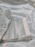 Close-up of powder green Maheshwari Silk Zari fabric – zari weave detail, 2-piece unstitched suit material