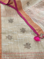 Indian handloom Jamdani linen fabric close-up – oatmeal base with woven metallic stars