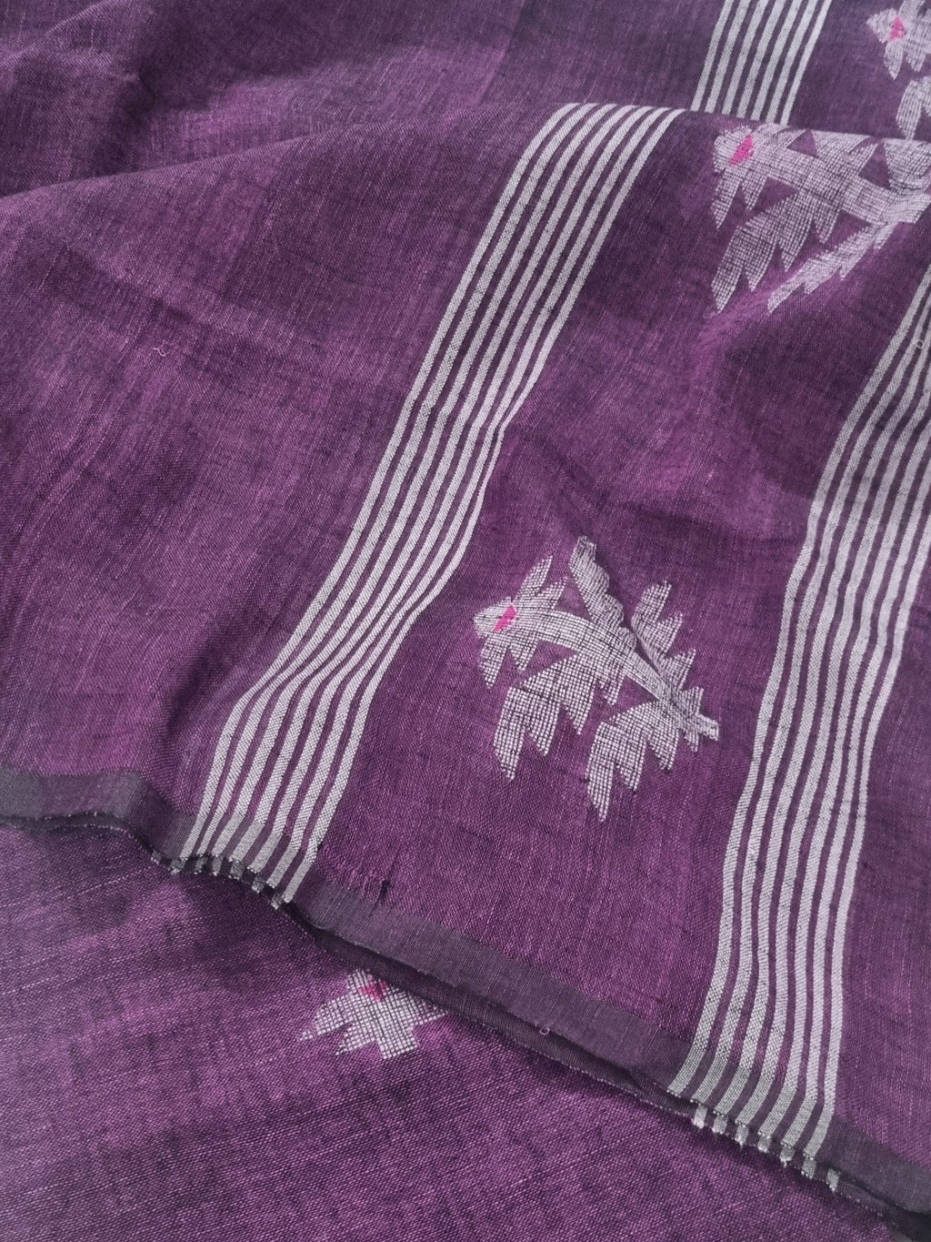 60 Lea linen unstitched suit material in deep purple – close-up of all-over woven motifs, pure Indian handloom