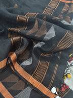 Handwoven linen 2-piece suit fabric in black – inverted triangle woven pattern with geometric daman border, unstitched