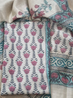 Close-up of block print Munga silk unstitched suit – beige, red, grey handloom