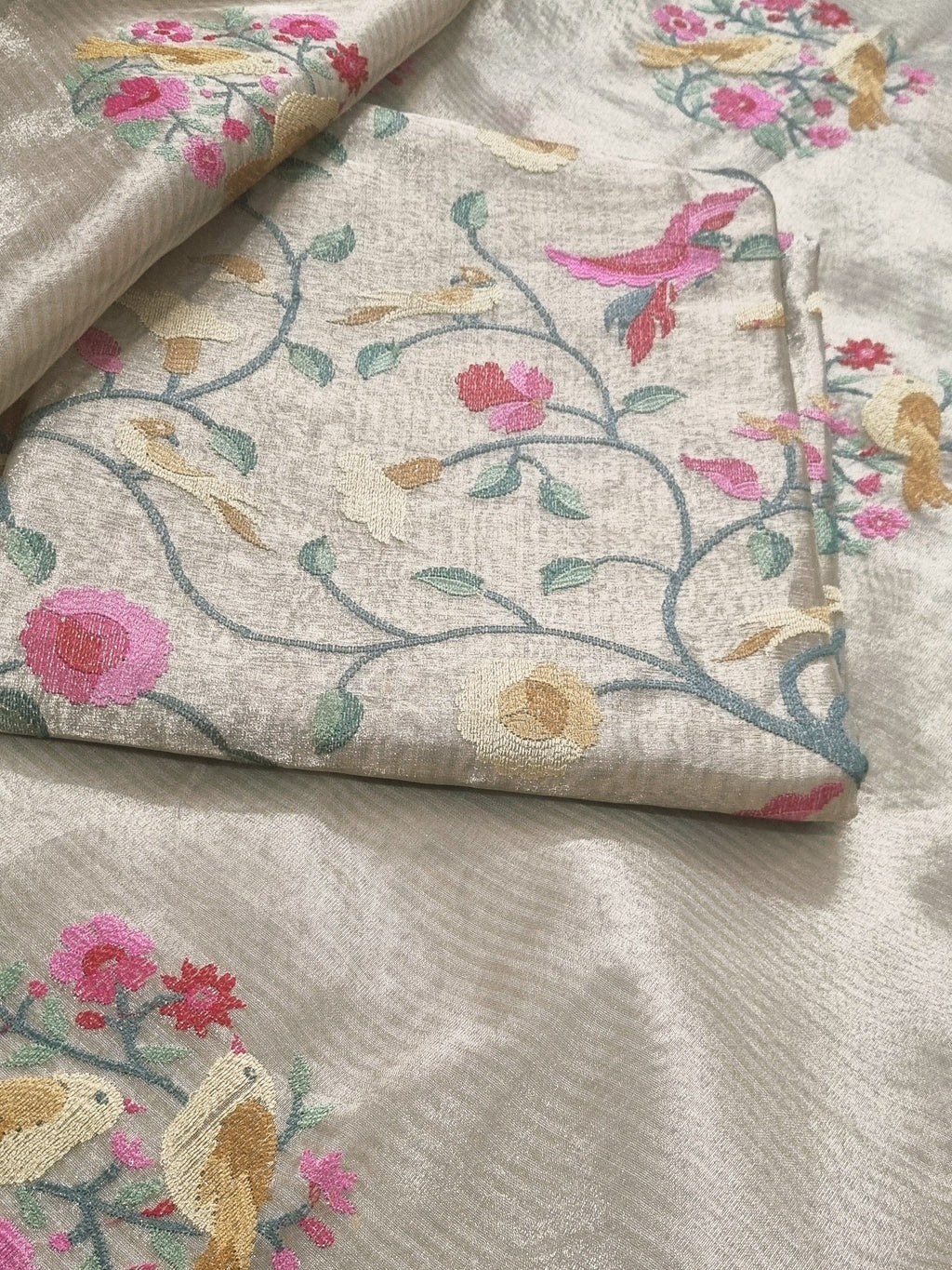 Detail view – machine embroidery on gold brocade kurta fabric