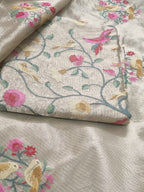 Detail view – machine embroidery on gold brocade kurta fabric