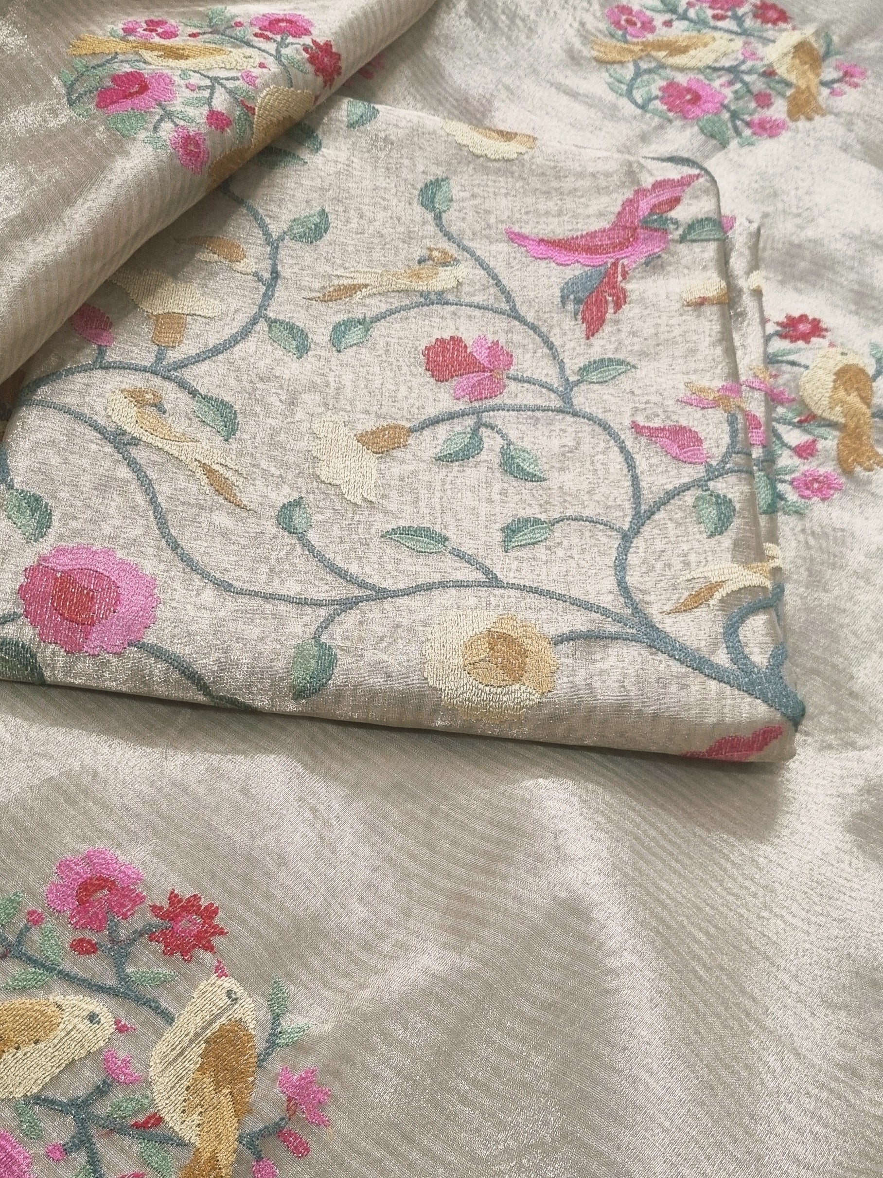 Detail view – machine embroidery on gold brocade kurta fabric