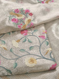 Close-up – handloom gold brocade fabric texture with intricate embroidery