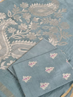 Flat lay of sea green Banarasi unstitched suit set — Karwa Booti handwoven Indian handloom fabric