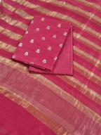 Flat lay of pink Banarasi unstitched suit set — Karwa Booti handwoven Indian handloom fabric
