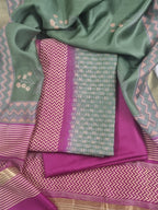 Maheshwari silk 3-piece unstitched suit – fabric texture close-up in forest green and purple