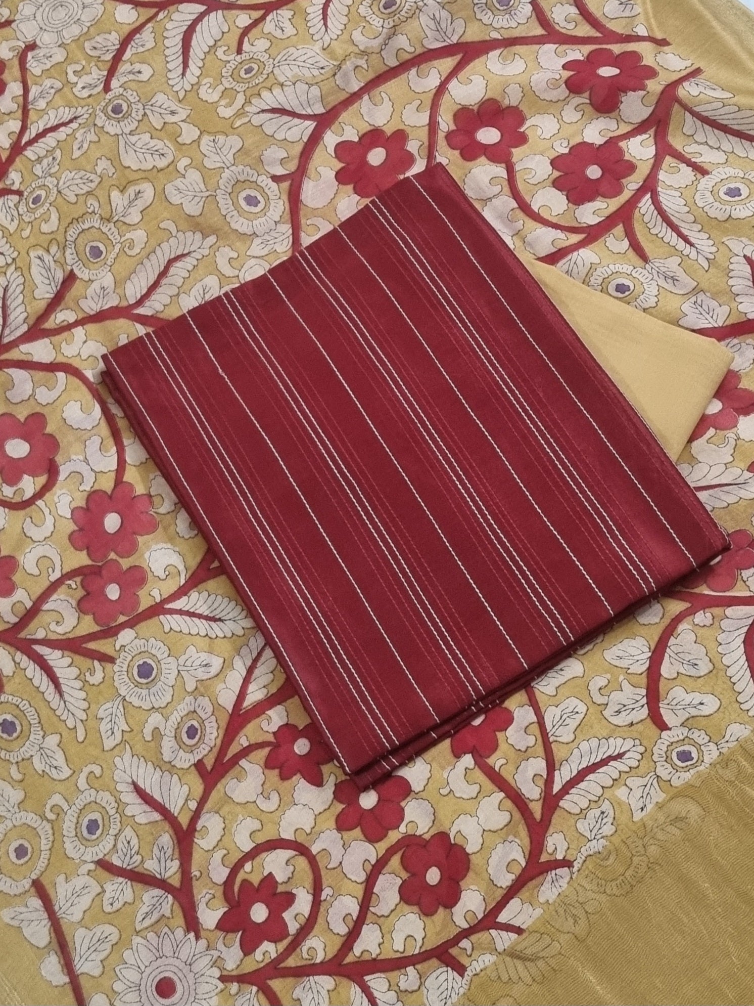 Maroon Chanderi silk suit set with Zari dupatta borders – close-up
