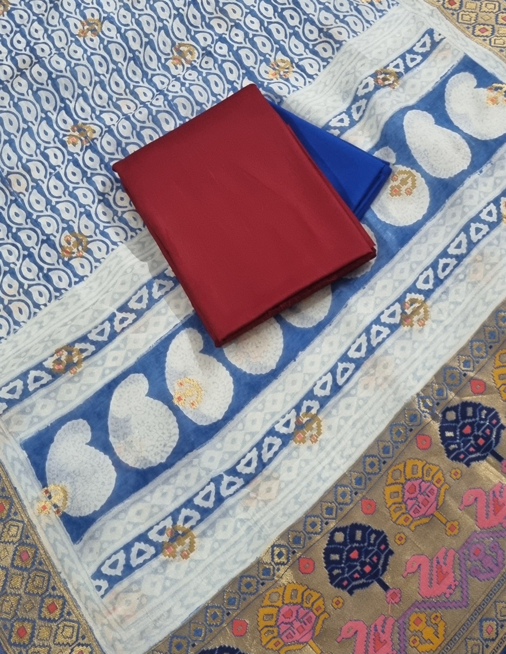 Flat Lay of 3-Piece Unstitched Suit - Maroon Top, Bottom & Royal Blue Dupatta