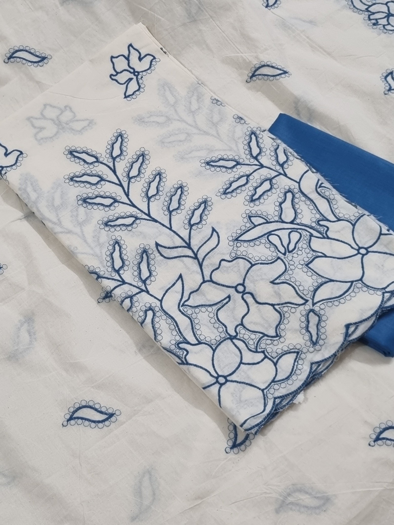 Front view of cream blue 3-piece unstitched suit with scalloped detailing – Tantuvanacrafts