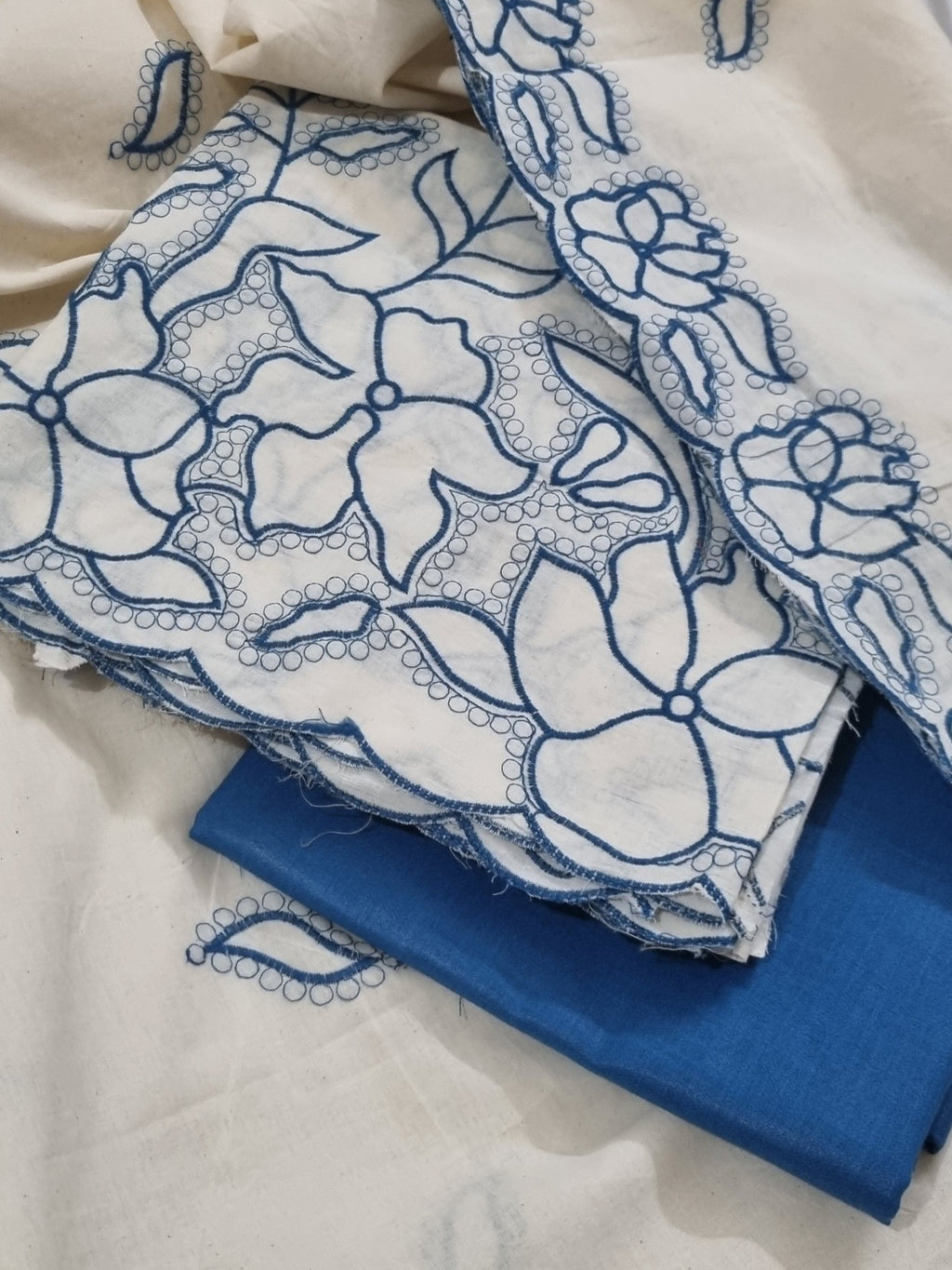 Side view of 3-piece unstitched ethnic suit set in cream and blue – handloom cotton – Tantuvanacrafts