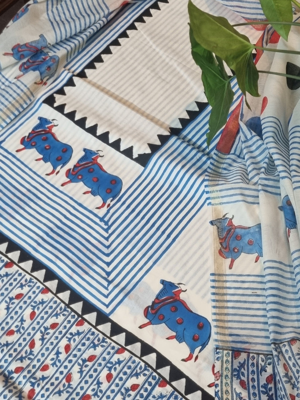 Placement Pichwai print 3-piece suit fabric set – flat lay styling