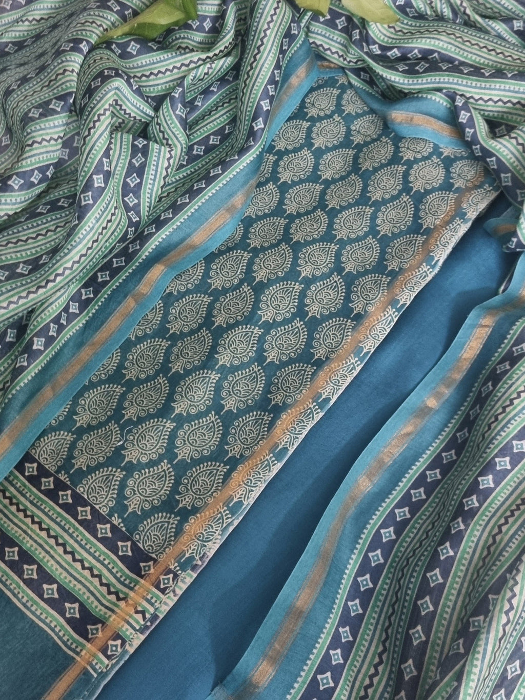 Chanderi silk unstitched suit with printed booti – ethnic wear close-up detail