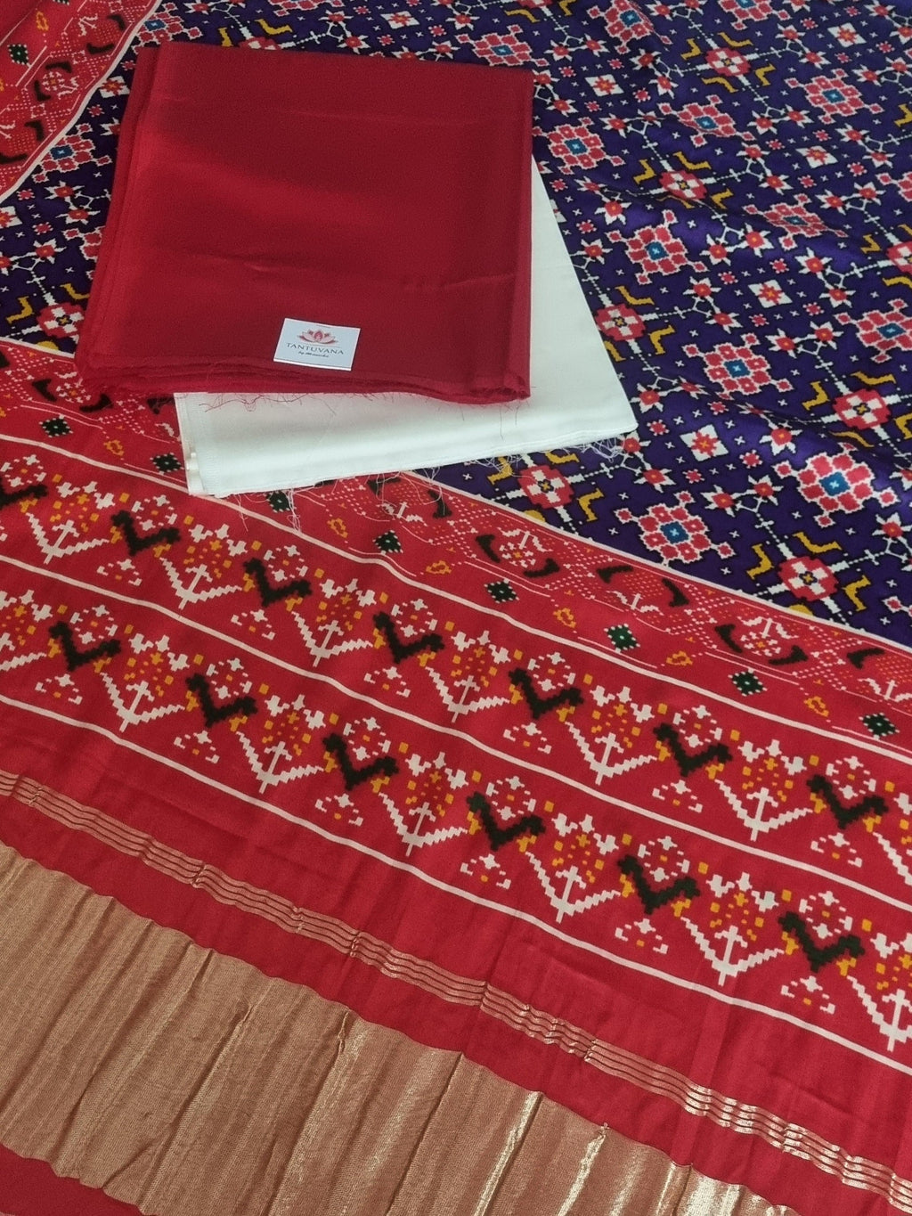 Close-up of red and off white cotton silk fabric with Patola print dupatta – 3-piece unstitched suit set