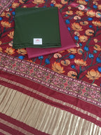 Green and maroon 3-piece unstitched suit set with Gajji Silk Kalamkari dupatta – flat lay