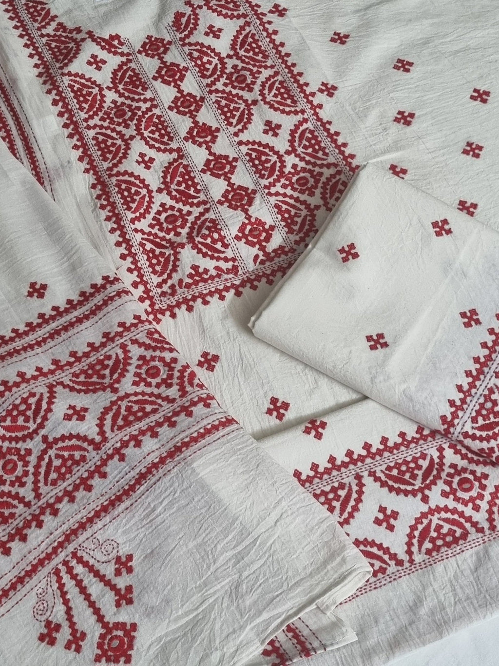 Cream & red cotton unstitched salwar suit with Sindhi hand embroidery – flat lay