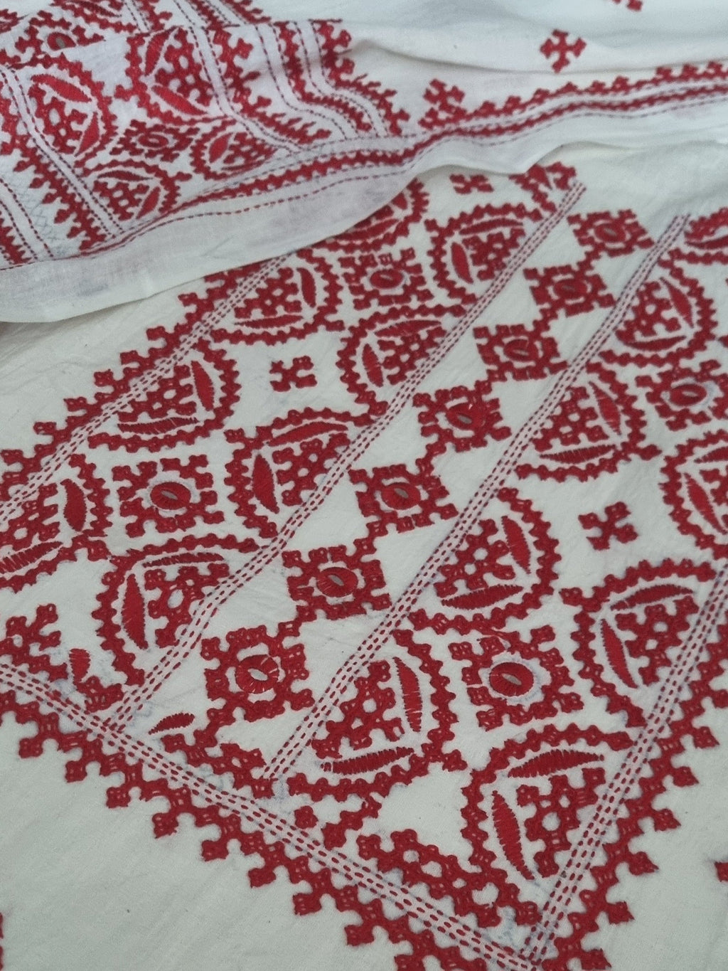 Cream & red Sindhi hand-embroidered cotton suit set – editorial portrait styling