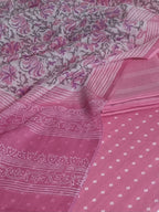 Handwoven cotton unstitched suit fabric in pink and white – close-up texture