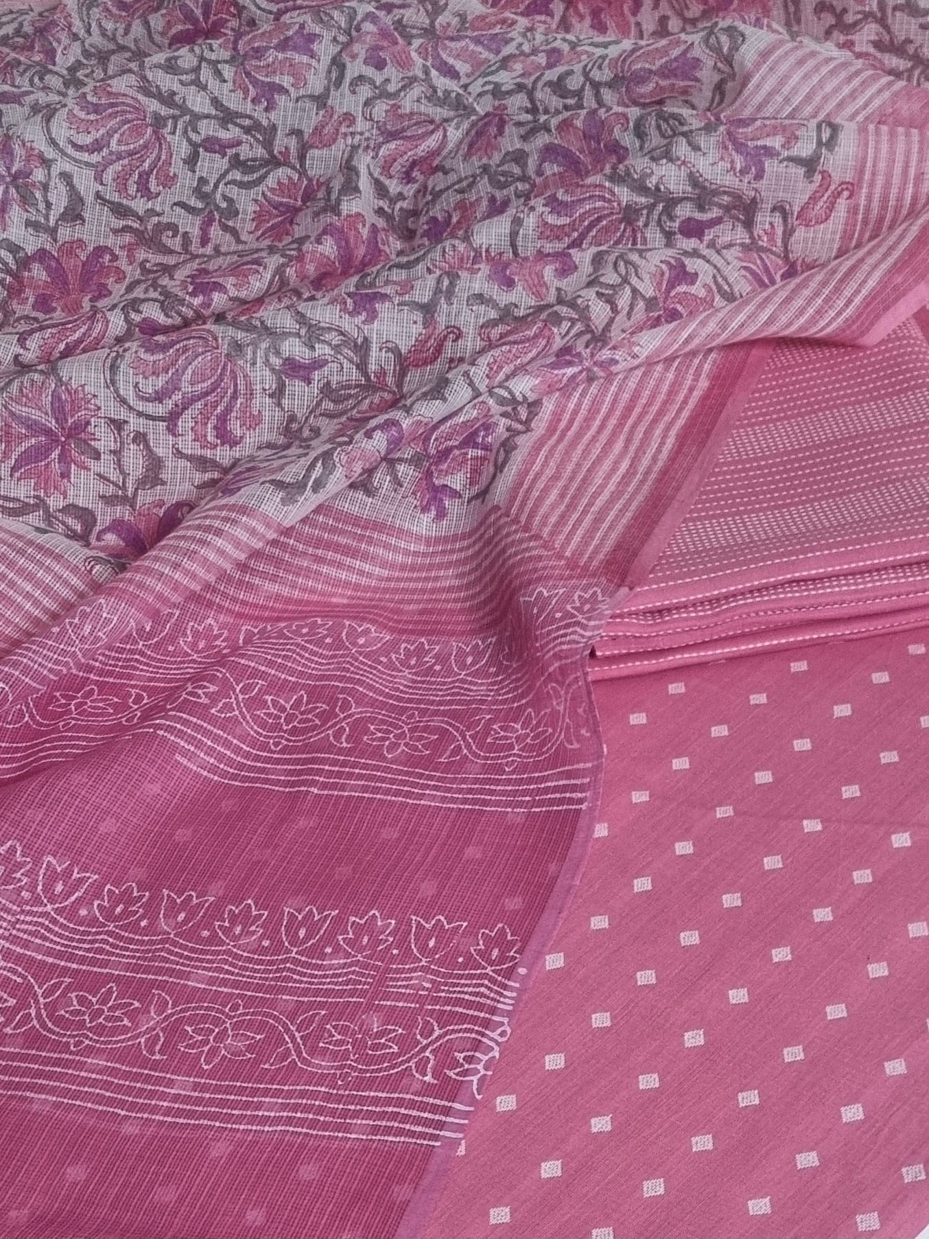 Handwoven cotton unstitched suit fabric in pink and white – close-up texture