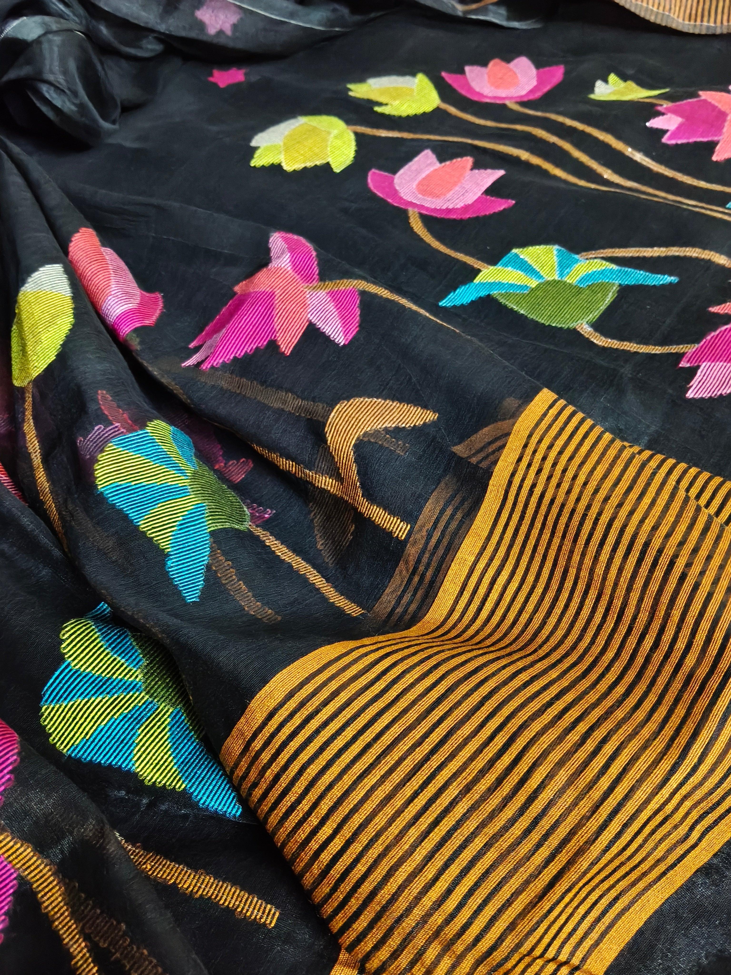 Bengal Jamdani suit fabric detail – midnight black with intricate multicolor woven star motifs, Indian handloom