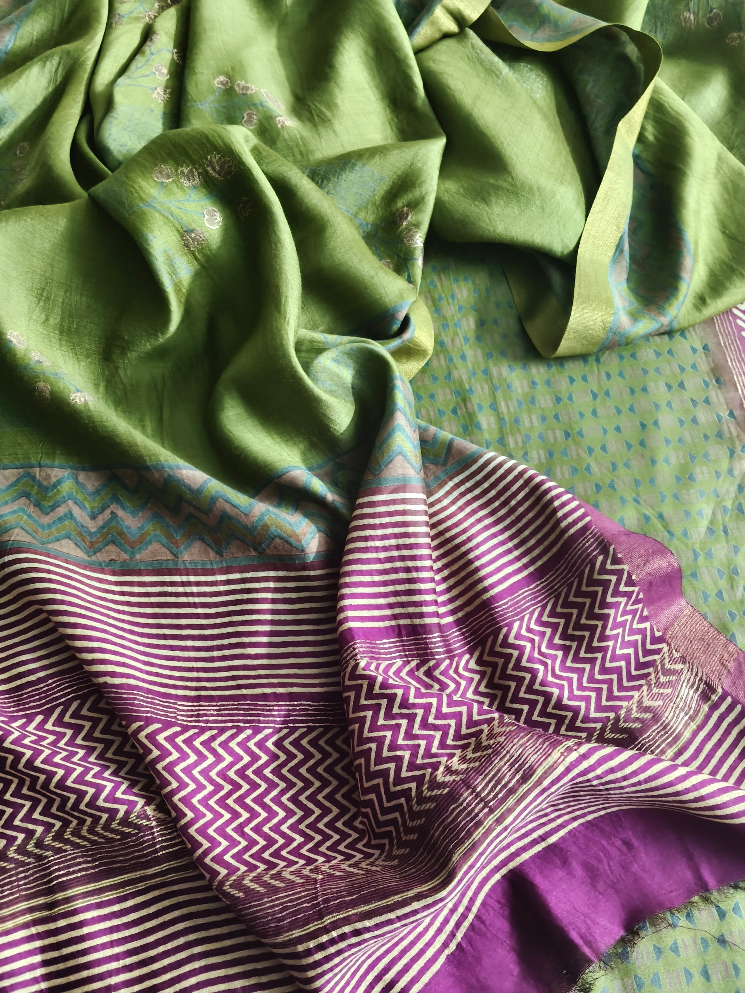 Unstitched Maheshwari silk suit set – green and purple ethnic wear flat lay