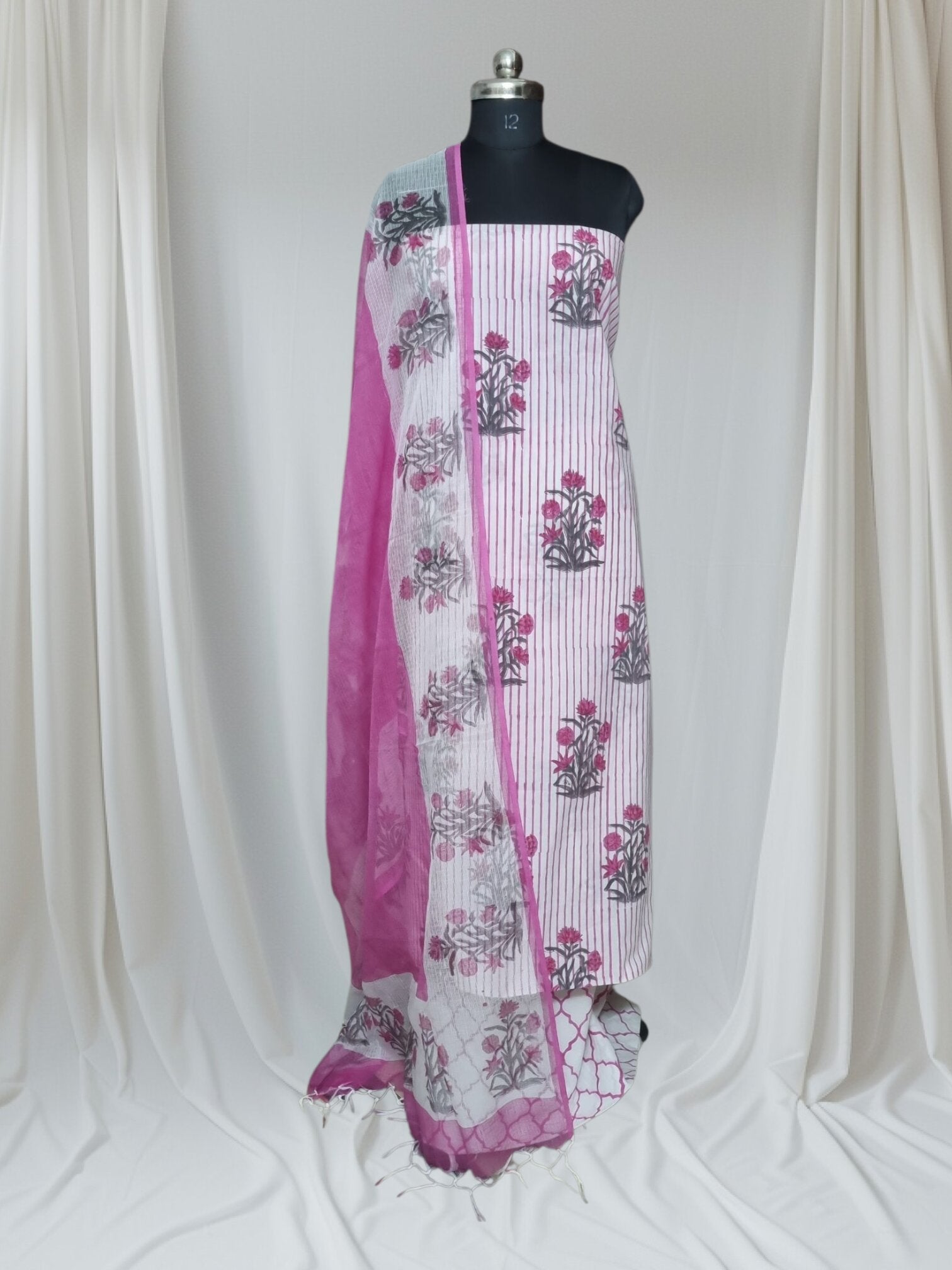 Cream pink block print unstitched suit – editorial product shot