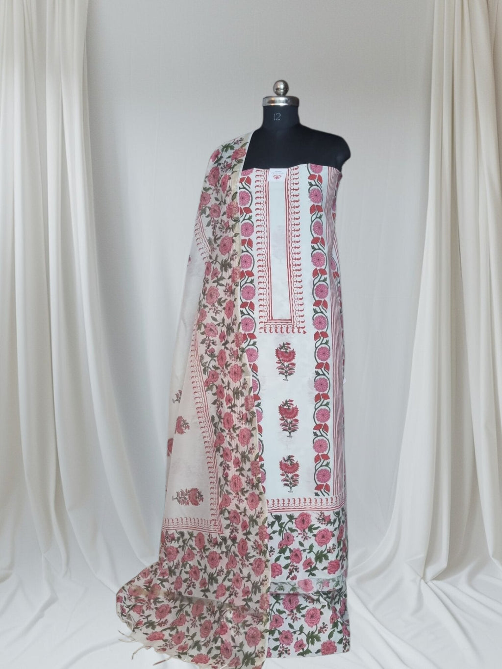 Placement floral block print unstitched suit – white background product shot