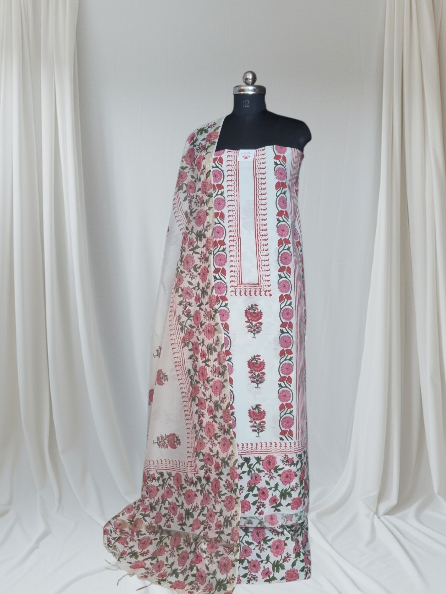 Placement floral block print unstitched suit – white background product shot