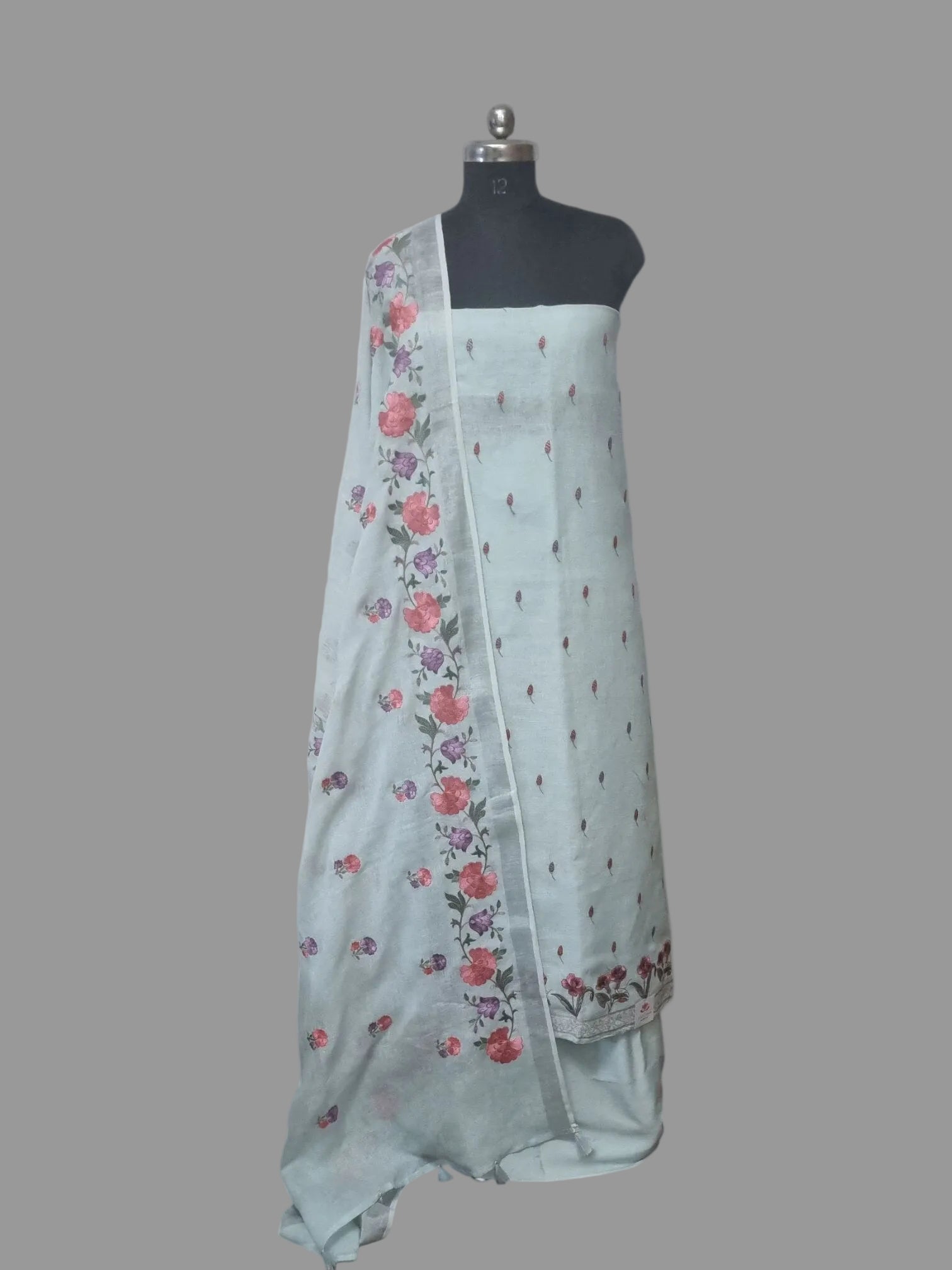 Baby blue floral machine embroidery linen unstitched suit set – front view