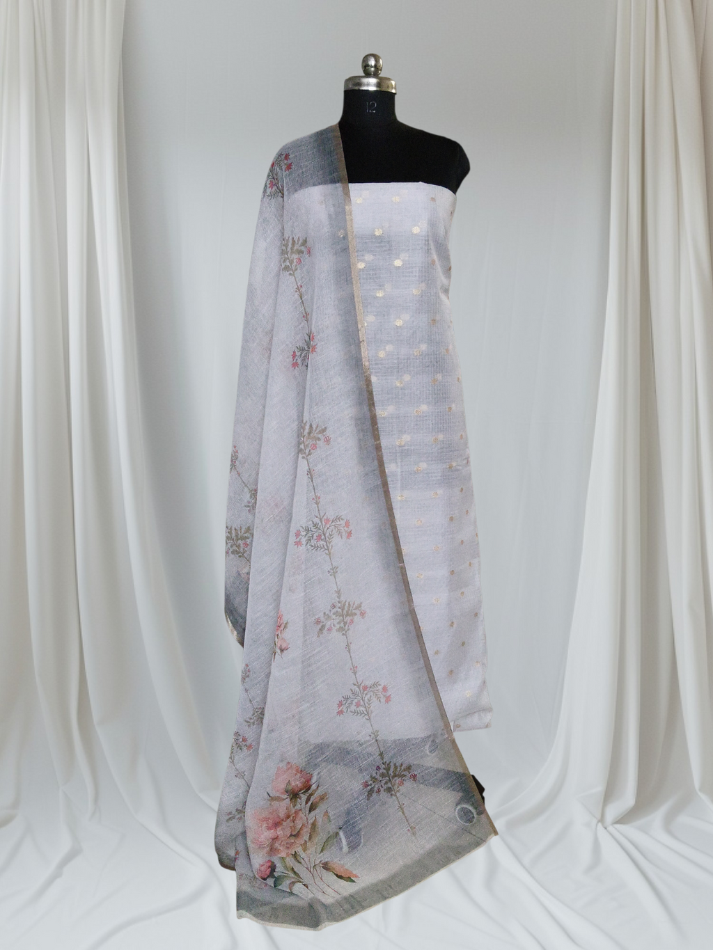 Styled flat lay of grey Kota Doria 2-piece unstitched suit – lightweight handloom cotton ethnic wear