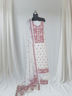 Cream & red Sindhi hand-embroidered cotton suit set – editorial portrait styling
