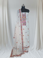Cream orange bird Parsi Gara hand-embroidered cotton suit set – editorial portrait styling