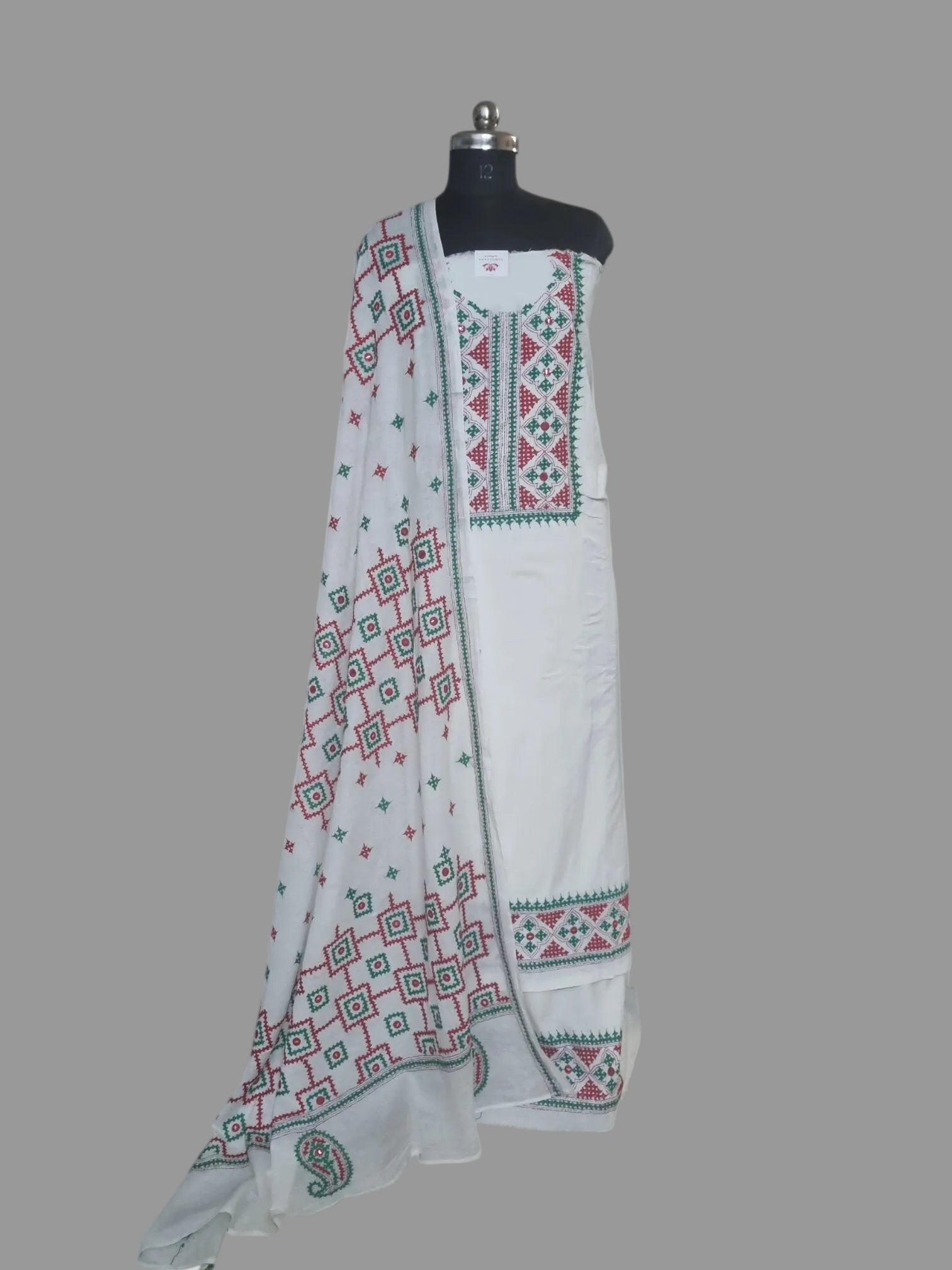 Cream red green Sindhi hand-embroidered unstitched suit set in cotton – front view