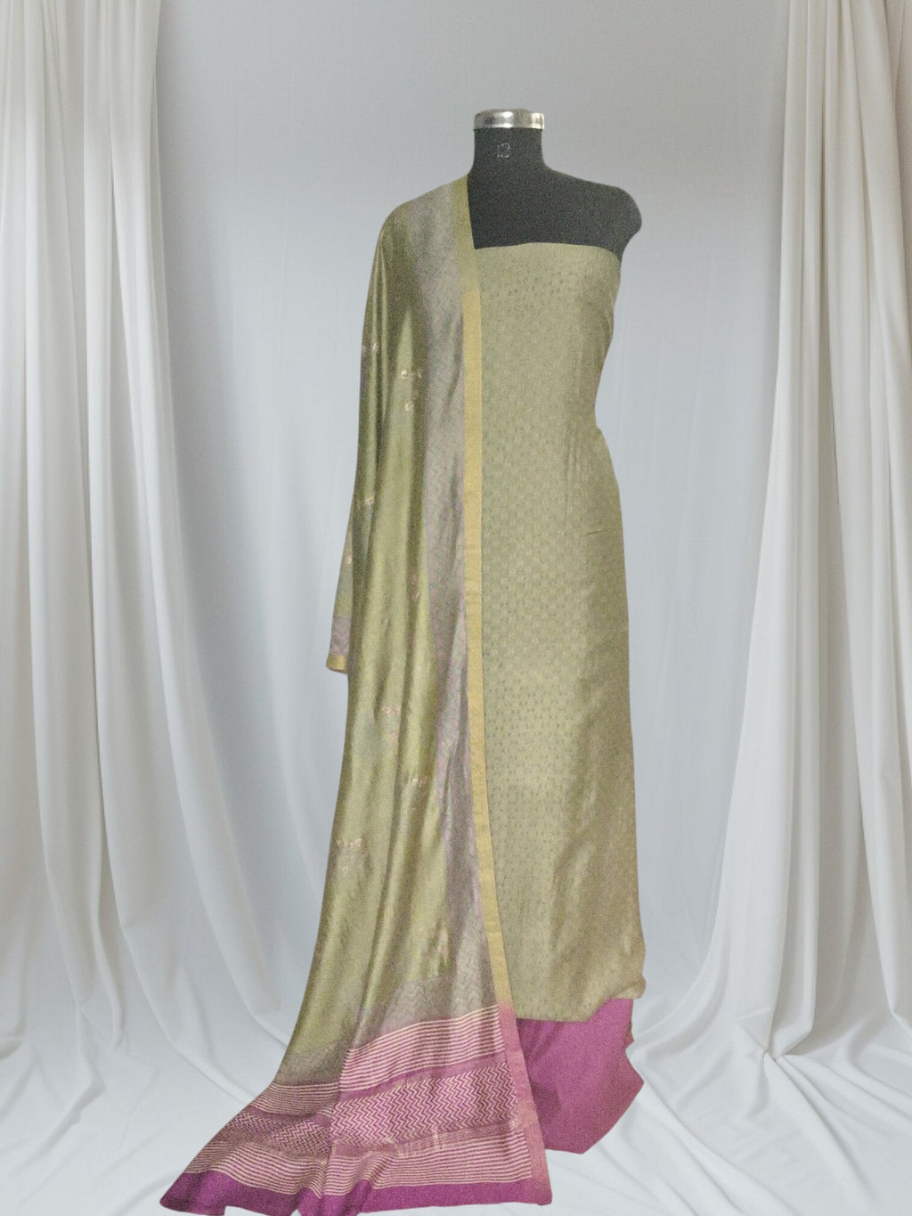 Maheshwari silk unstitched suit set – editorial portrait in green and purple
