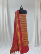Indian handloom 3-piece unstitched suit – red orange cotton fabric close-up