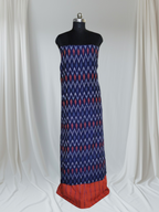 Handwoven ikat 2-piece unstitched set – navy blue and orange, portrait shot