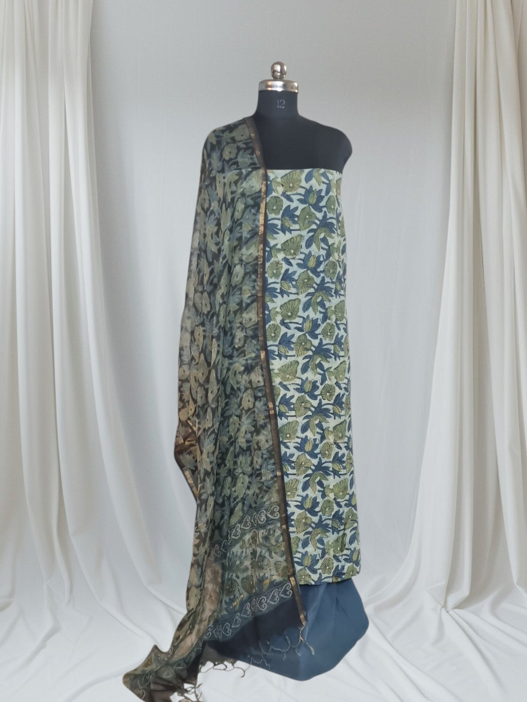 Mannequin wearing Vanaspati block print cotton suit with Kota Doria dupatta – blue and green