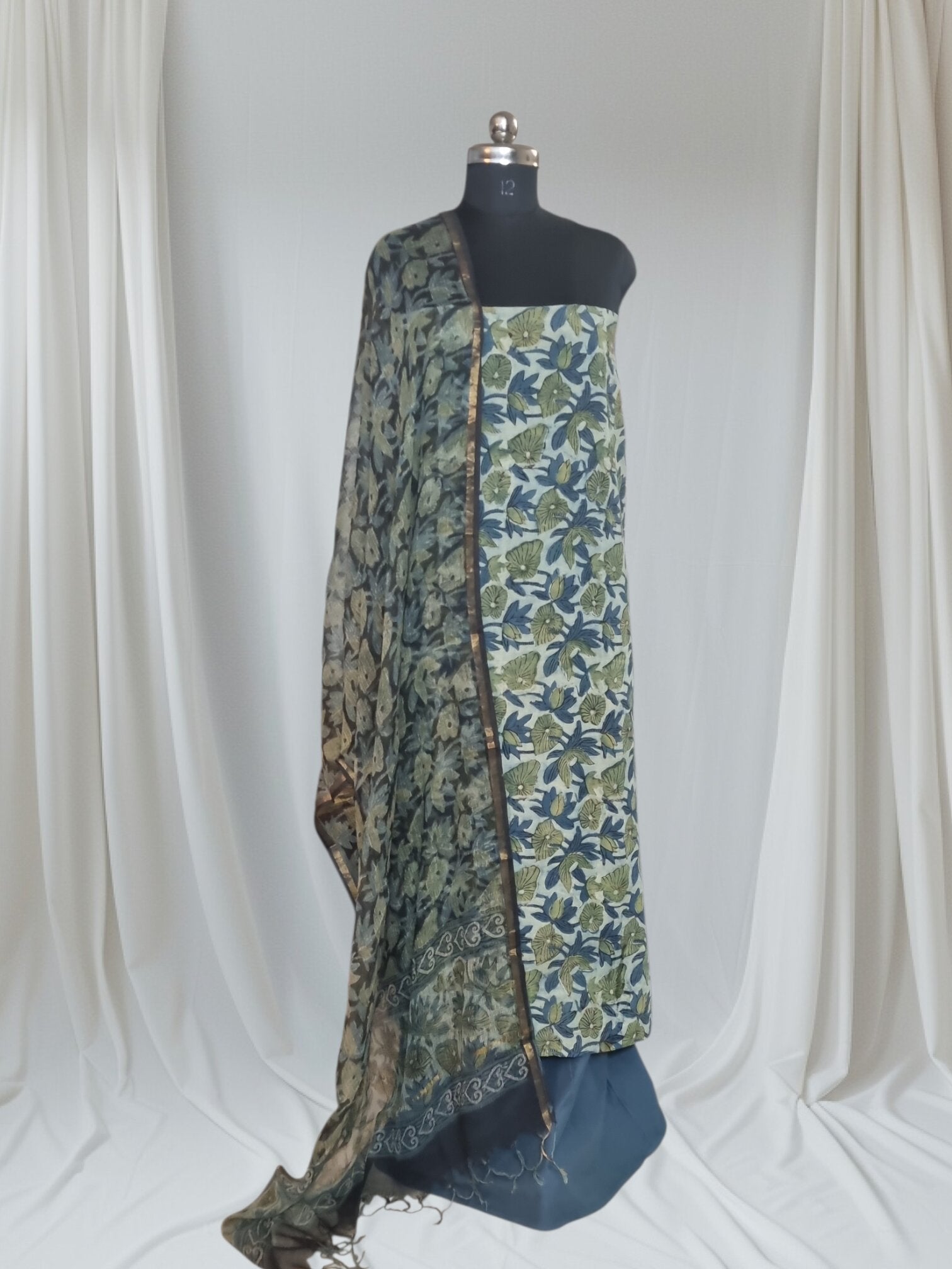 Mannequin wearing Vanaspati block print cotton suit with Kota Doria dupatta – blue and green