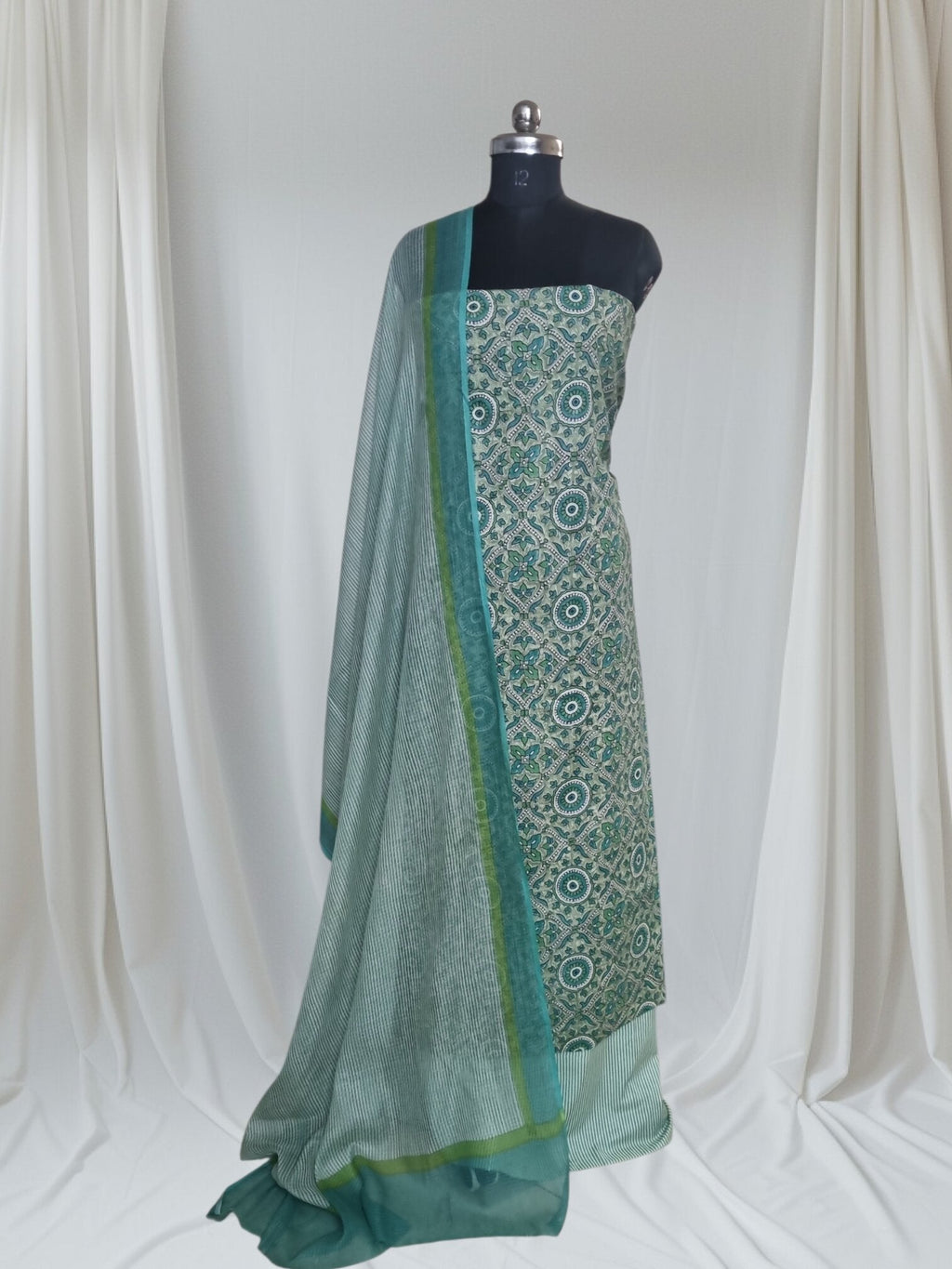 Green handloom cotton printed unstitched suit set – editorial portrait – Tantuvanacrafts
