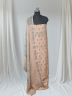 Light apricot machine embroidery linen suit – styled product shot